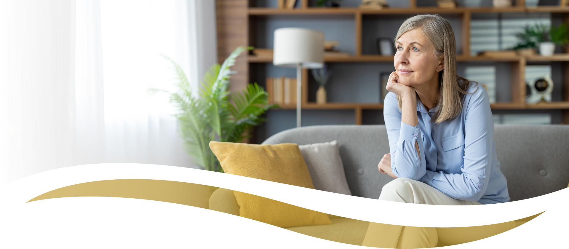 mature woman sitting on couch